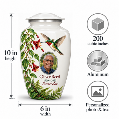 White hummingbird adult urn size guide showing 10 inch height, 6 inch width, 200 cubic inches, Aluminum and personalized photo and text