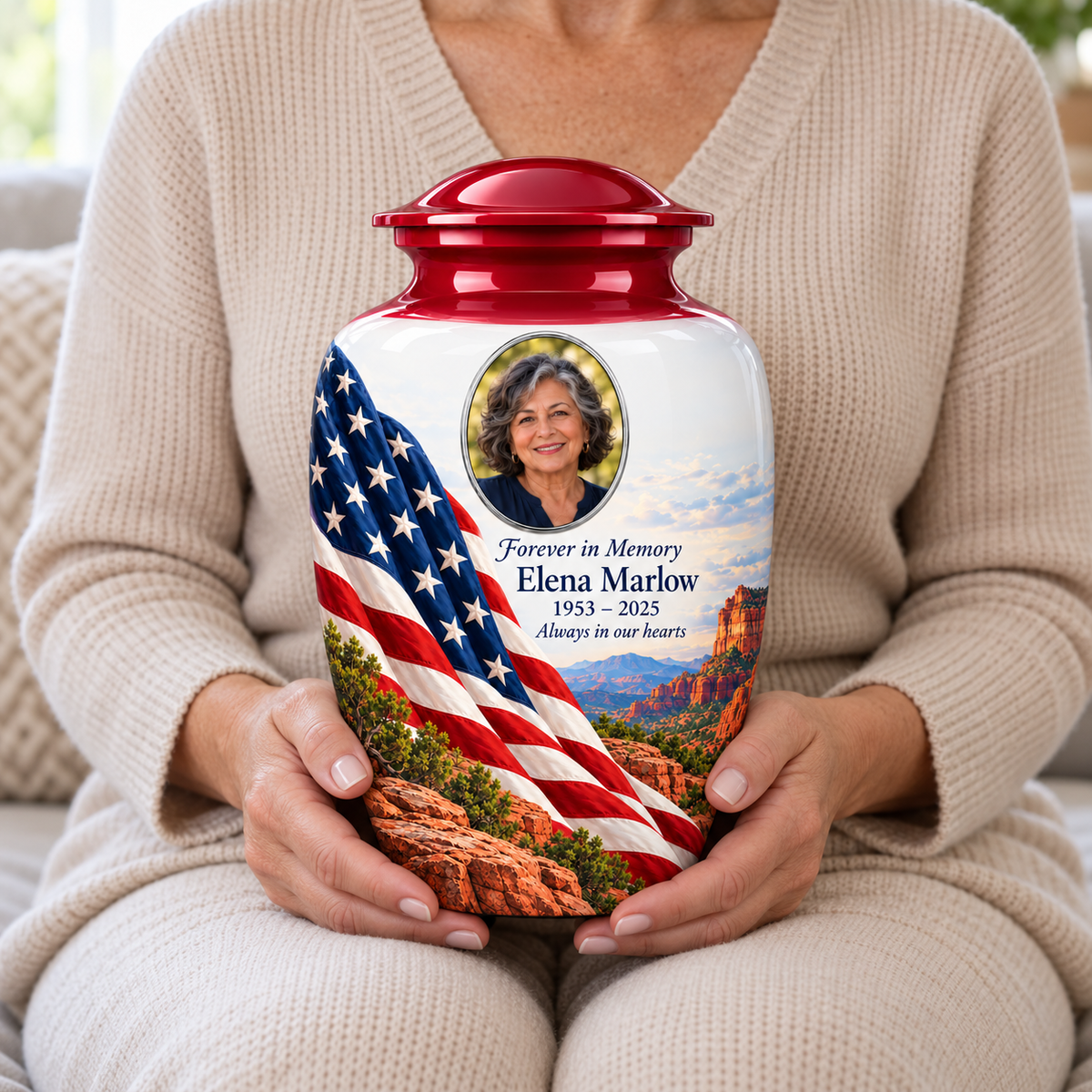 Desert Canyon American flag adult urn with sample photo and text held upright on a seated person’s lap