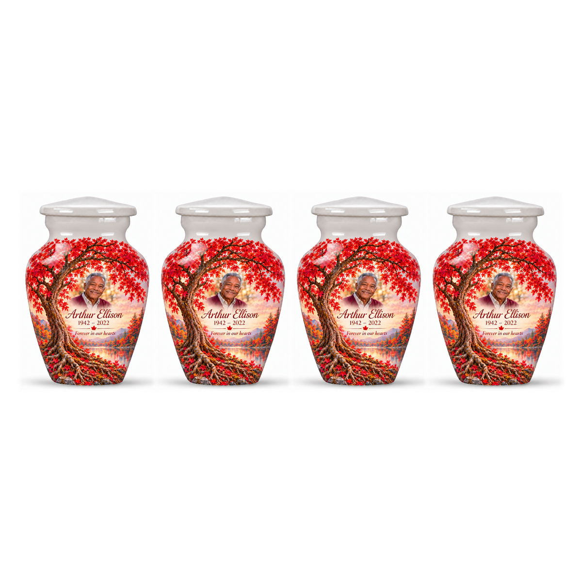 Four matching Crimson Maple Tree of Life keepsake urns with sample photo and text on a white background