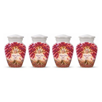 Four matching Purple Beech Tree of Life keepsake urns with sample photo and text on a white background