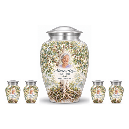 One Silver Aspen Tree of Life adult urn with four matching keepsake urns, sample photo and text, on a white background