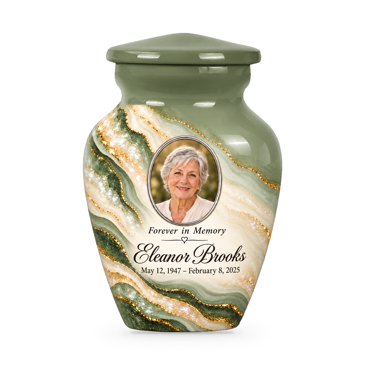 One Sage Cascade green and ivory keepsake urn with a sample portrait, name and dates.