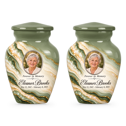 Two matching Sage Cascade keepsake urns with sample portrait, name and dates.