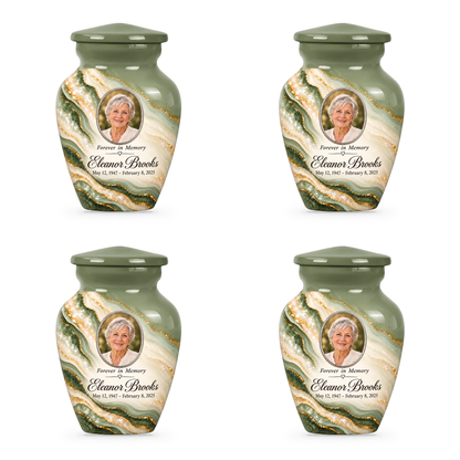 Four matching Sage Cascade keepsake urns with sample portrait, name and dates.