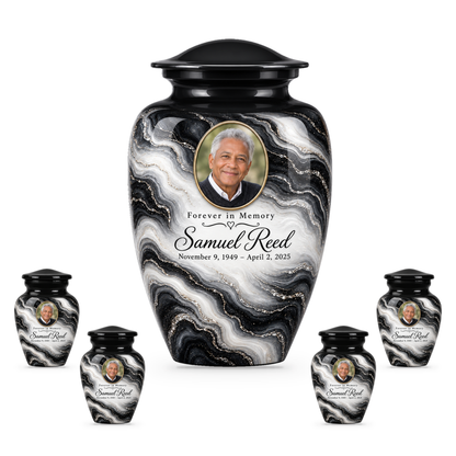 Black Pearl set with one adult urn and four smaller keepsakes, with matching sample personalization.