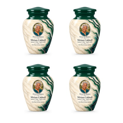 Four matching Emerald Estuary keepsake urns with sample photo and memorial text.