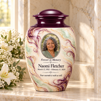 Aubergine Wisp adult urn in a columbarium setting with fictional sample photo and text.