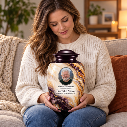 Plum Escarpment adult urn held on a lap with fictional sample photo and text.