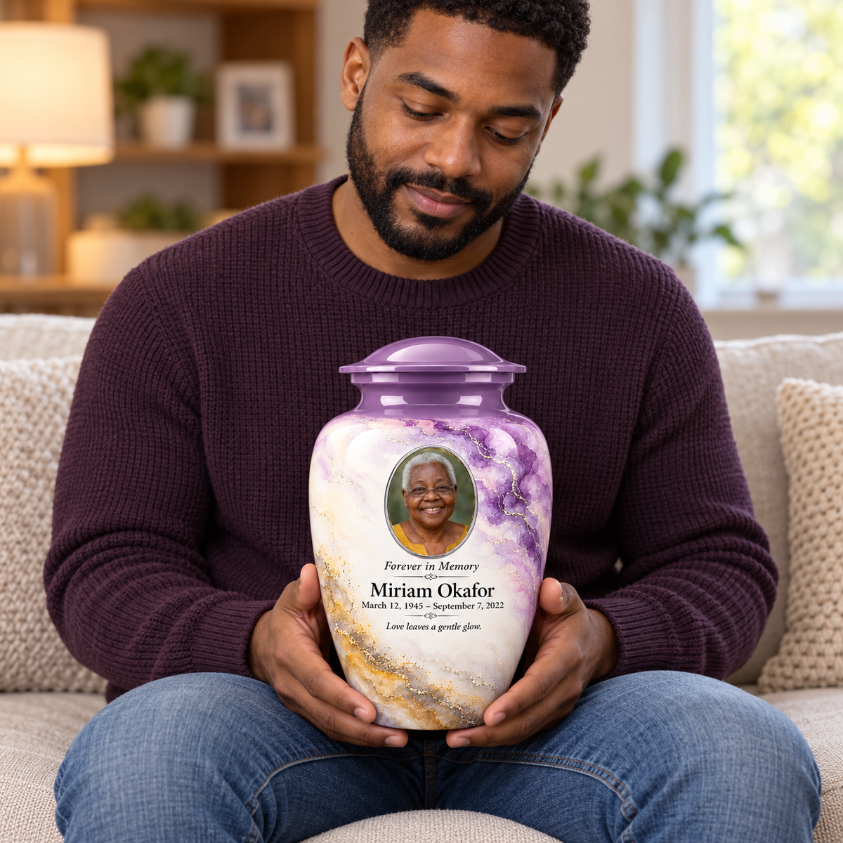 Wisteria Nimbus adult urn held on a lap with fictional sample photo and text.