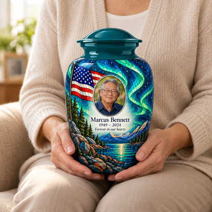 Aurora Lake American flag adult urn with sample photo and text held upright on a seated person’s lap