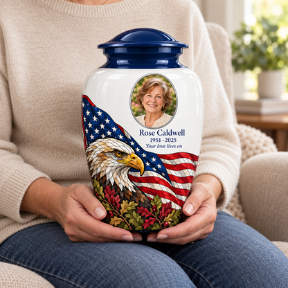 Eagle Flag American flag adult urn with sample photo and text held upright on a seated person’s lap