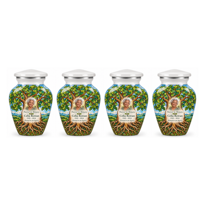 Four matching White Oak Mosaic Tree of Life keepsake urns with sample photo and text on a white background