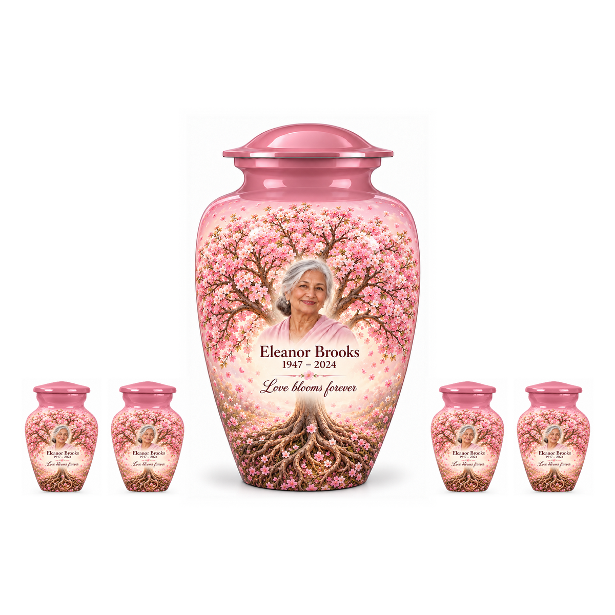 One Pink Cherry Blossom Tree of Life adult urn with four matching keepsake urns, sample photo and text, on a white background