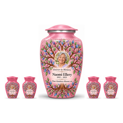 One pink Tree of Life adult urn centered between four matching keepsakes on white, all with Naomi Ellery sample portrait and memorial text.
