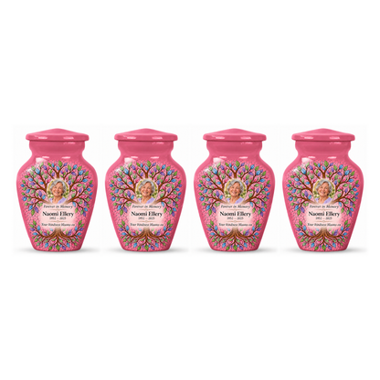 Four matching pink Tree of Life keepsake urns in a row on white, each with Naomi Ellery sample portrait and memorial text.