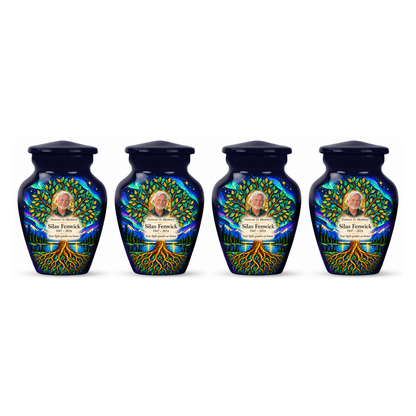 Four dark blue aurora Tree of Life keepsake urns in a row on white, each with Silas Fenwick sample portrait and memorial text.