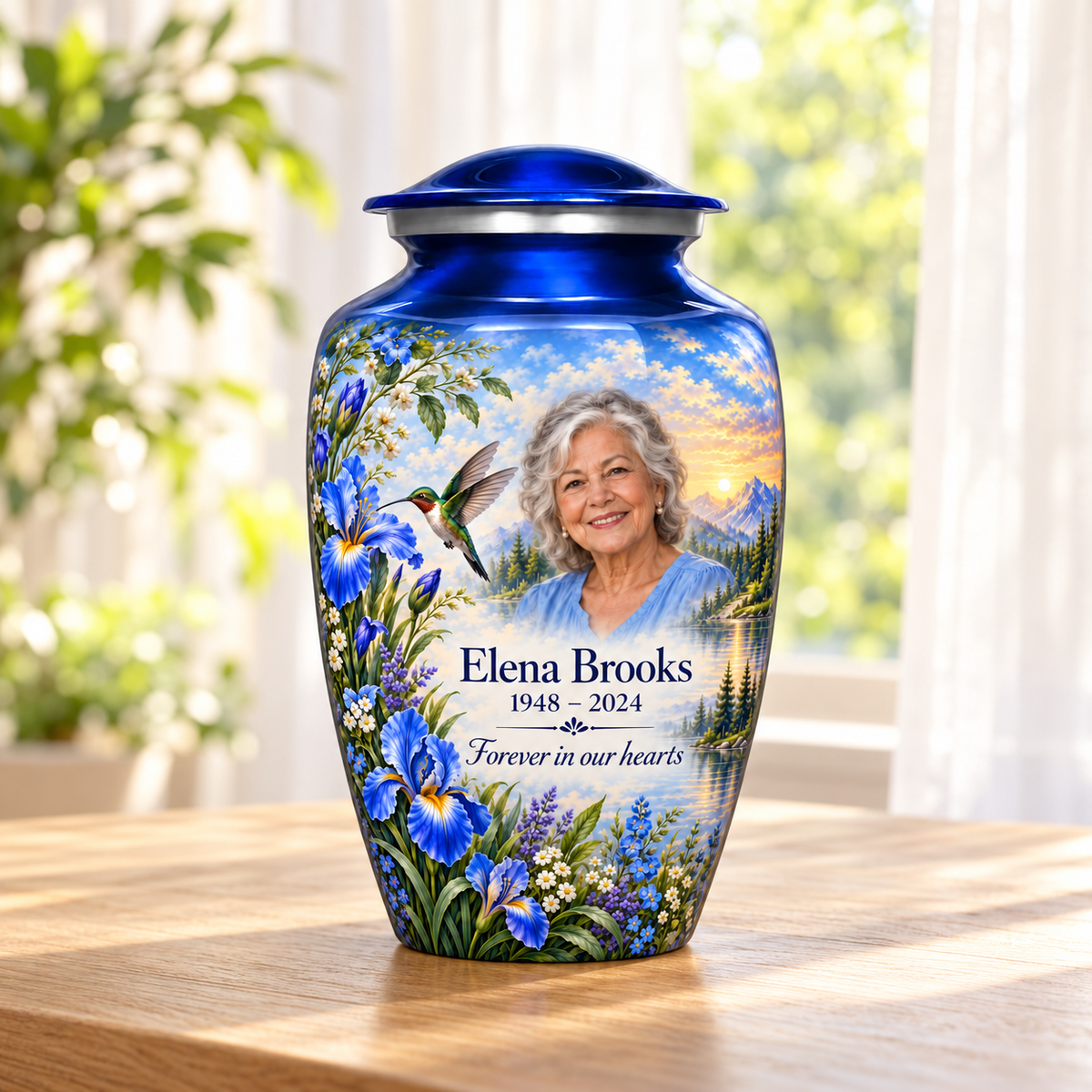 Blue hummingbird adult urn with irises, mountain lake and Elena Brooks sample photo and text in a sunlit home