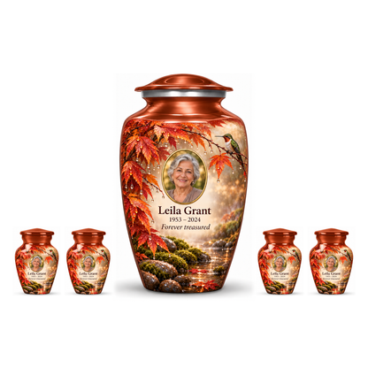 One orange hummingbird adult urn with four matching keepsakes, all with Leila Grant sample photo and text