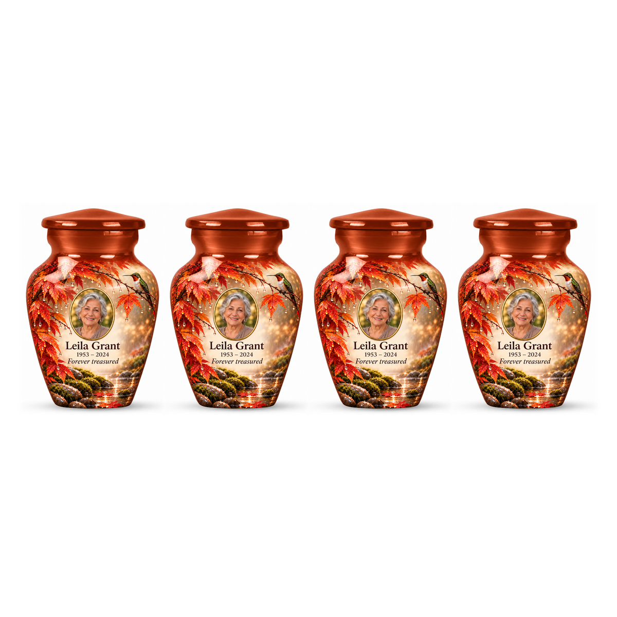 Four matching orange hummingbird keepsake urns with Leila Grant sample photo and text