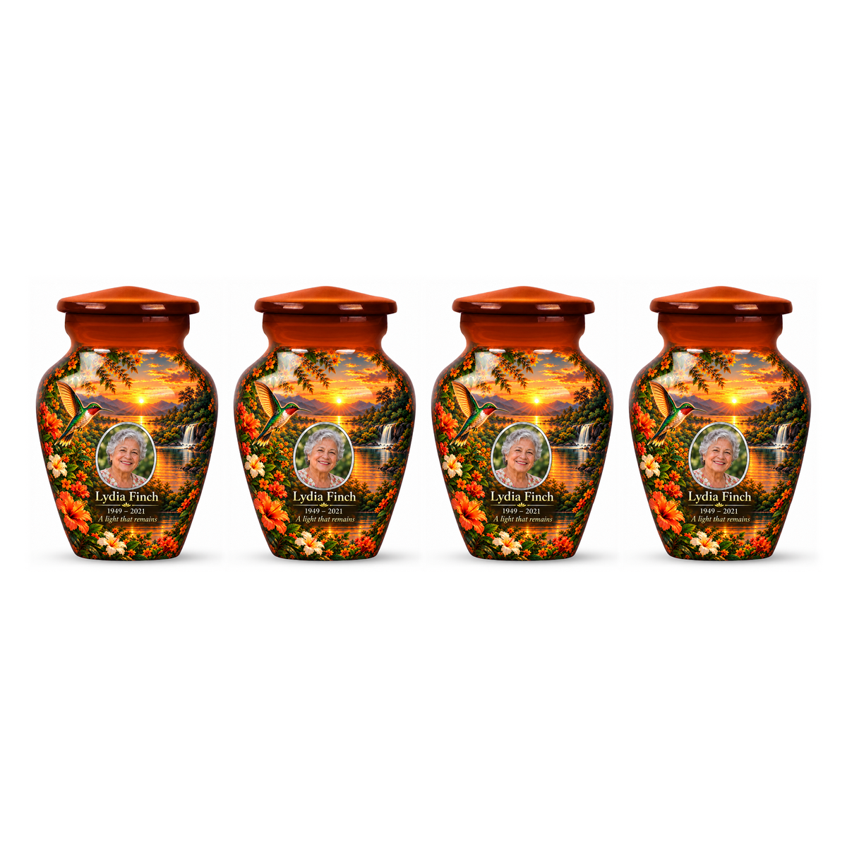 Four matching orange hummingbird keepsake urns with Lydia Finch sample photo and text