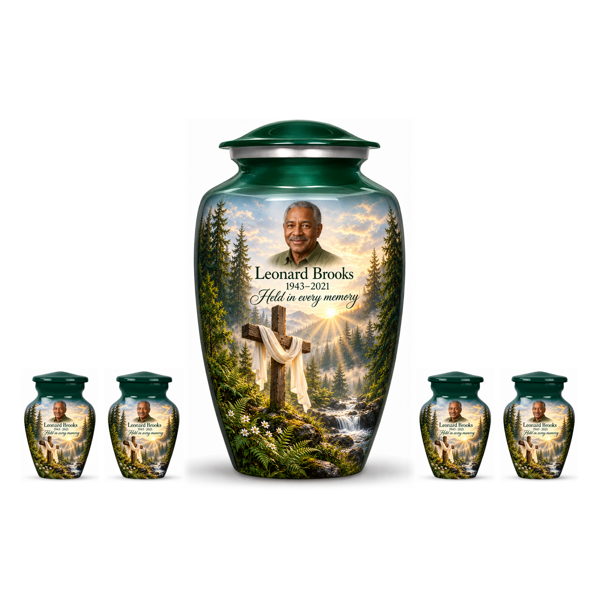 One green adult cross urn and four keepsakes with a sunlit woodland stream arranged on white.