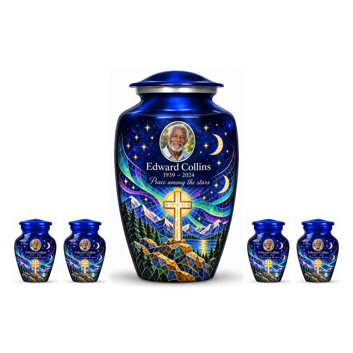 One blue adult cross urn and four keepsakes with a printed moonlit mosaic arranged on white.