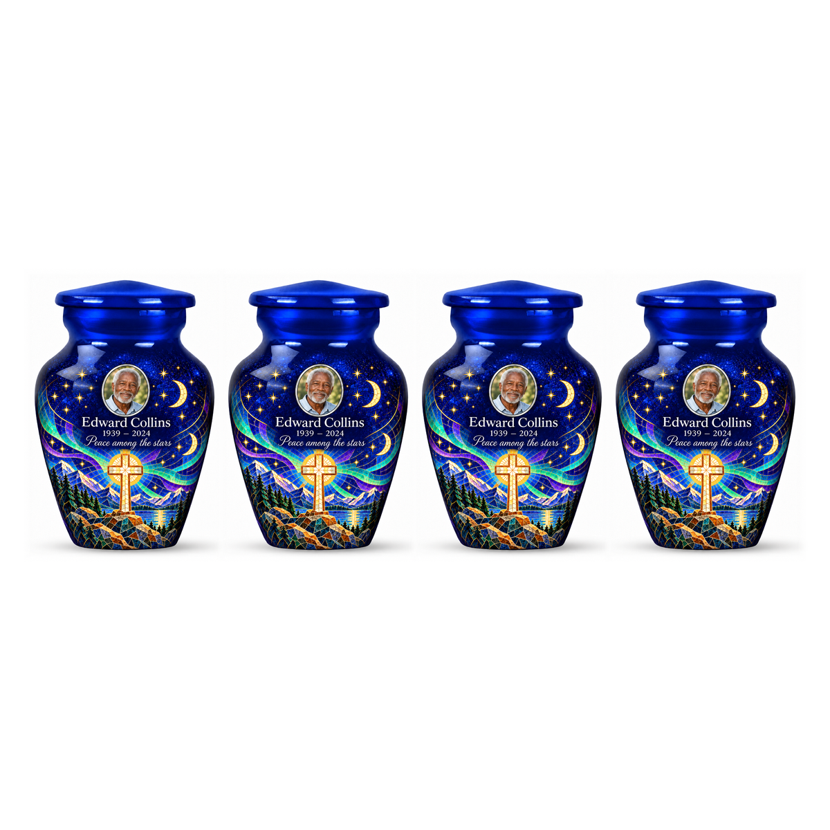 Four matching blue cross keepsake urns with a printed moonlit mosaic arranged on white.