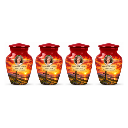 Four matching red cross keepsake urns with a red meadow sunset arranged on white.