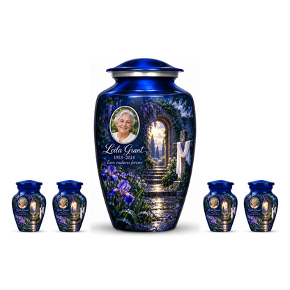 One blue adult cross urn and four keepsakes with a blue rain garden arranged on white.
