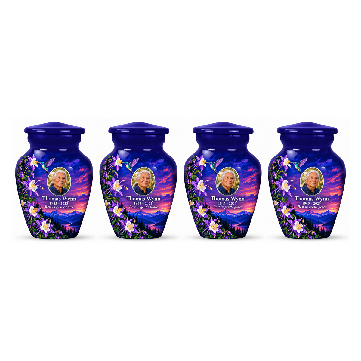 Four matching indigo blue hummingbird keepsake urns in a row on white, each with Thomas Wynn sample portrait and memorial text.