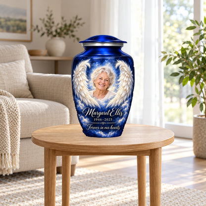 Blue angel wings adult memorial urn in a softly lit living room.