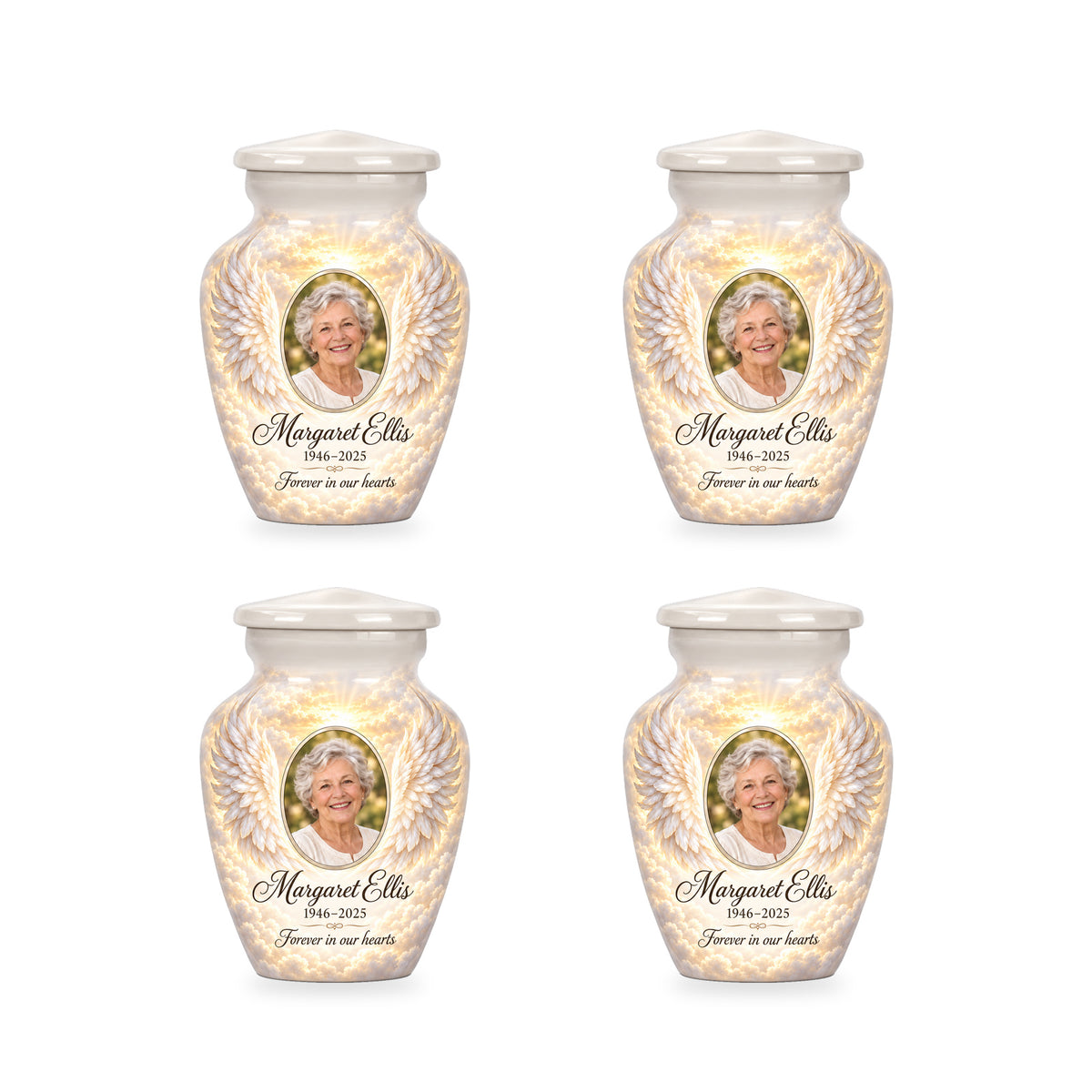 Four matching white angel wings keepsake urns with sample photo and inscription.
