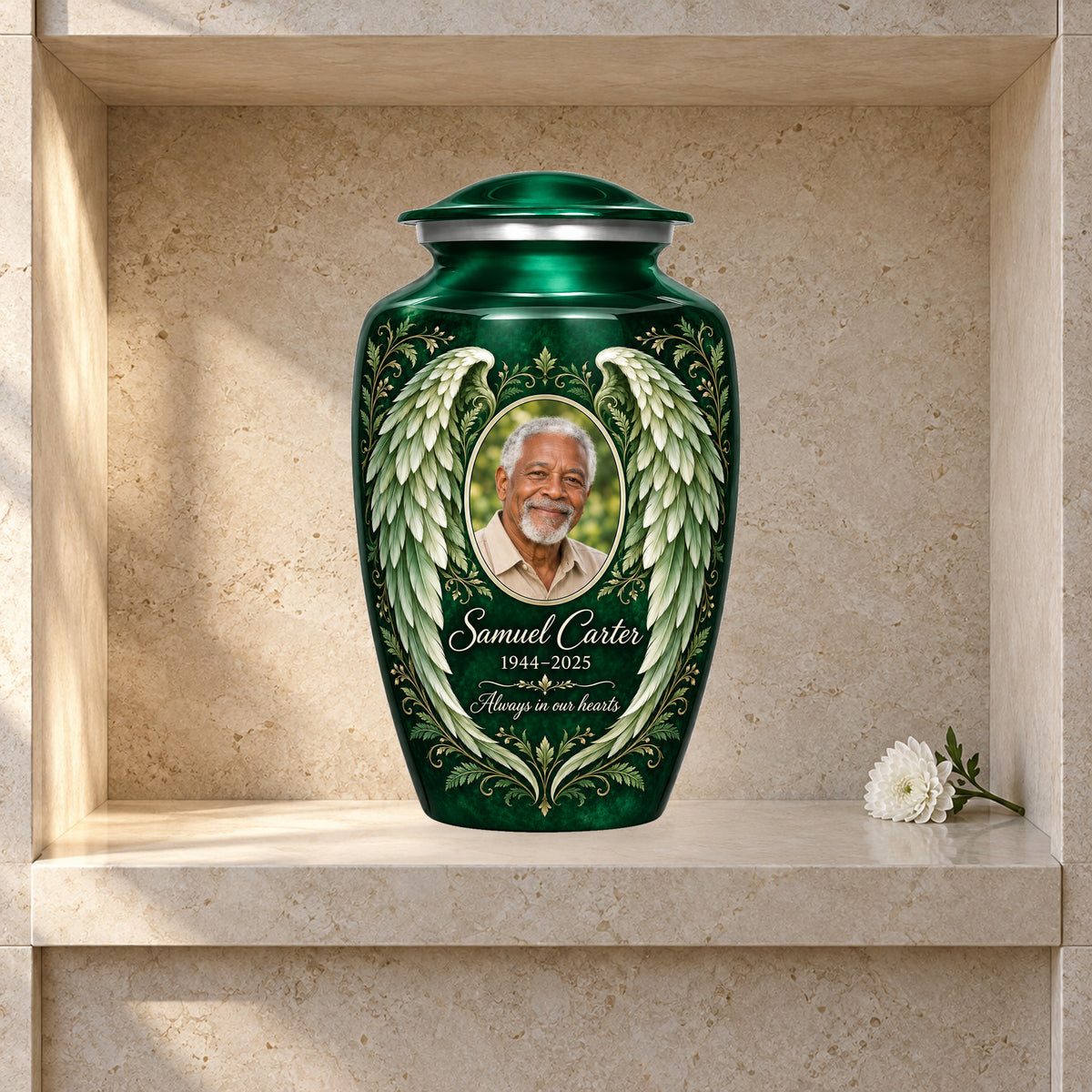 green adult urn with Botanical Wings angel wings artwork displayed in a columbarium niche.