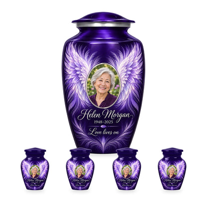 purple adult angel wings urn with four matching keepsakes shown in proportional 10-inch and 3-inch sizes.