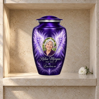 purple adult urn with Radiant Feather Wings angel wings artwork displayed in a columbarium niche.