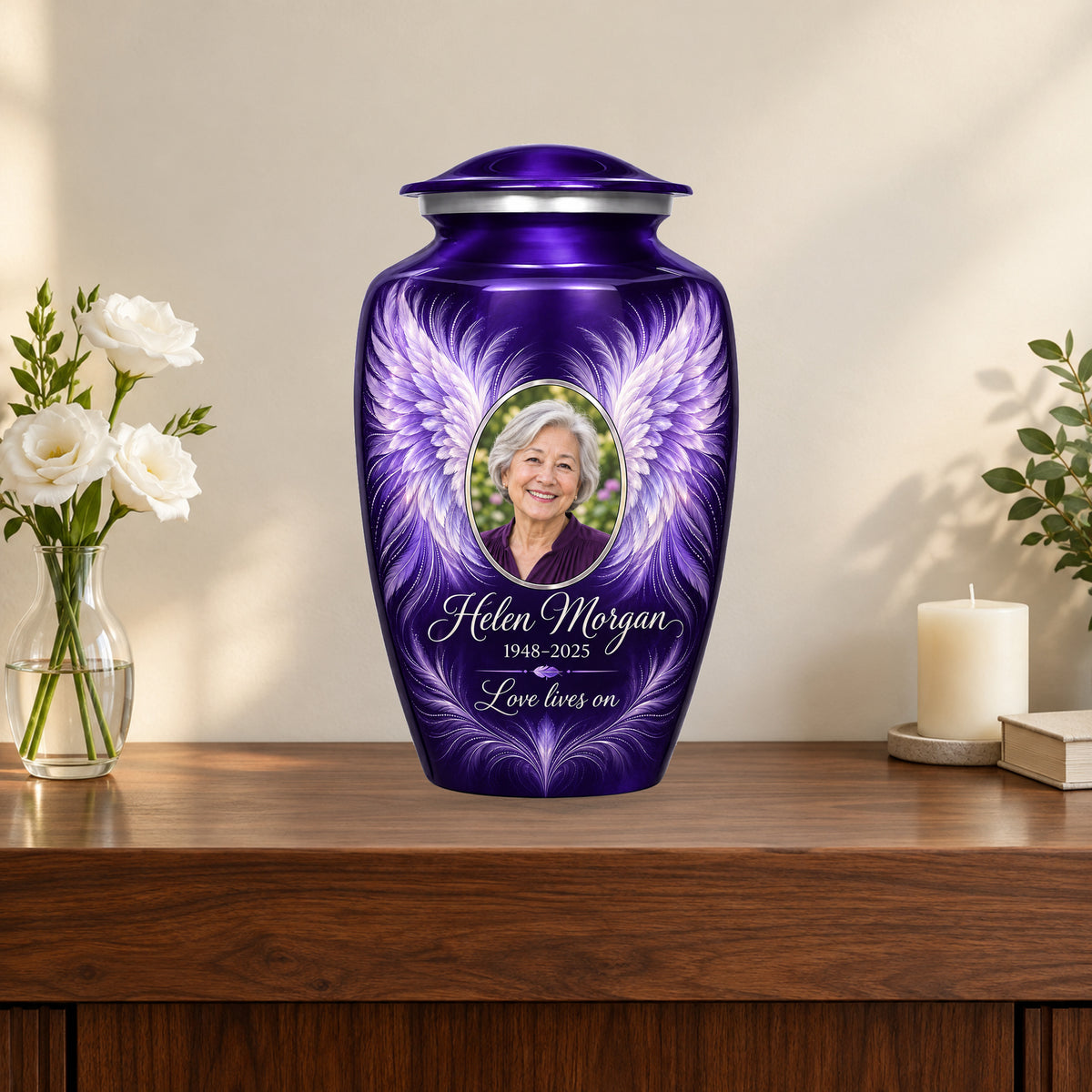 purple personalized angel wings adult urn on a memorial console.