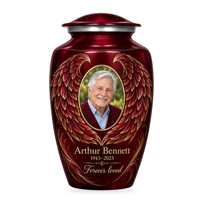 red adult urn with Golden Contour Wings angel wings artwork, fictional sample portrait and personalized inscription on white.