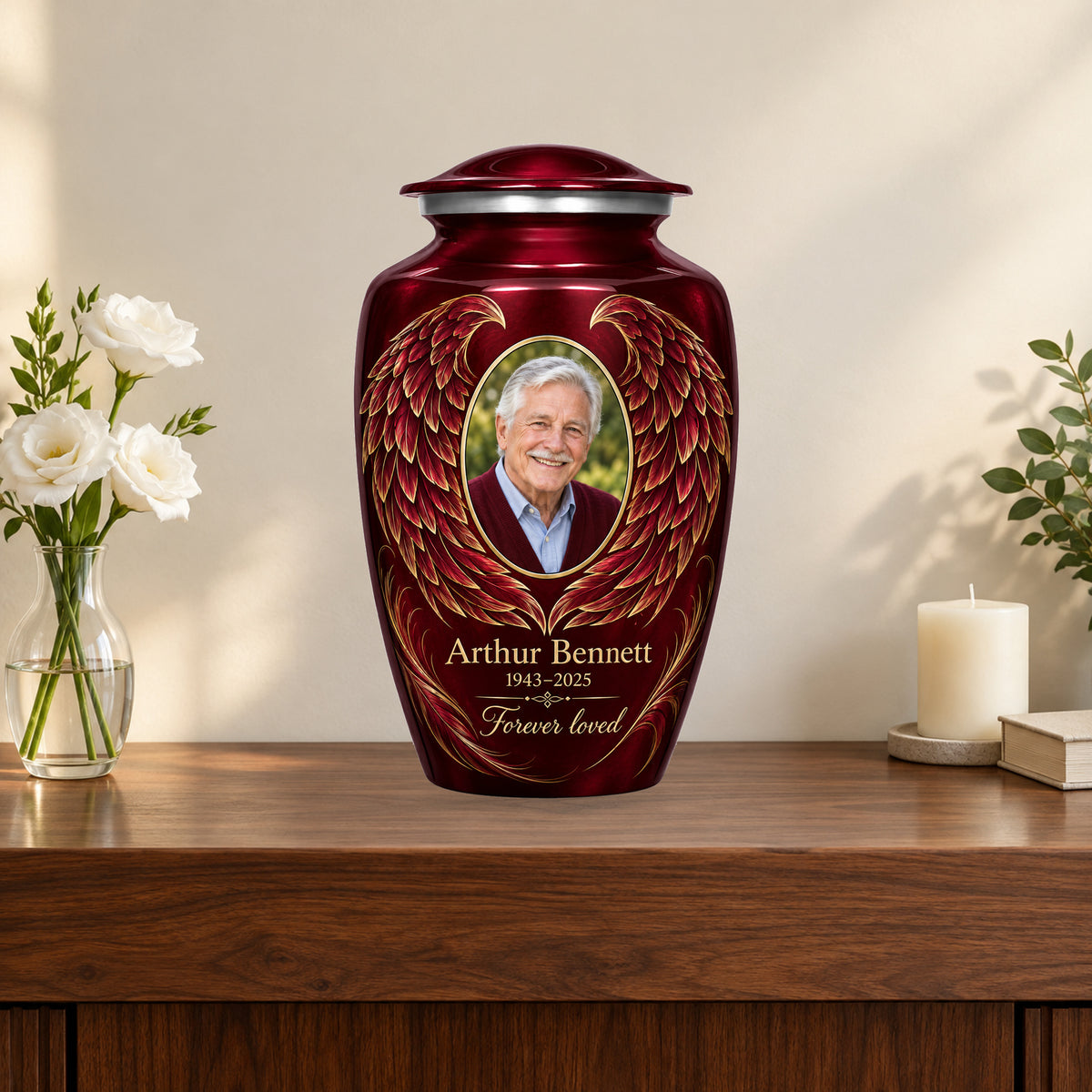 red personalized angel wings adult urn on a memorial console.