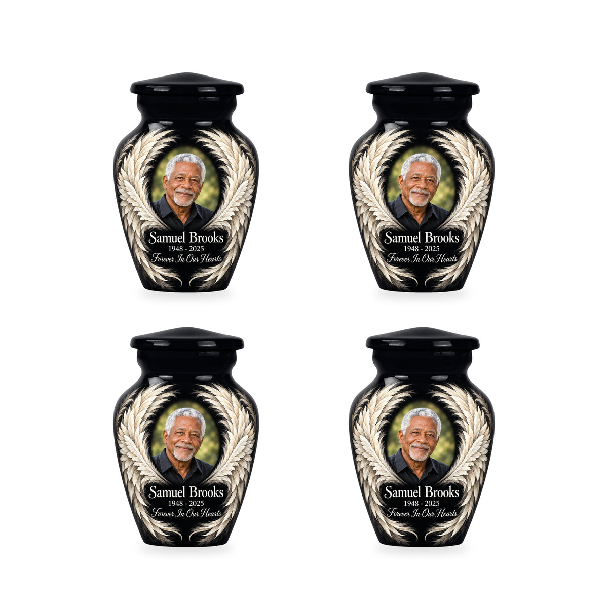 Four matching black angel wings keepsake urns with sample photo and inscription.