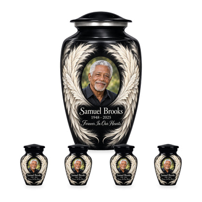 black adult angel wings urn with four matching keepsakes shown in proportional 10-inch and 3-inch sizes.