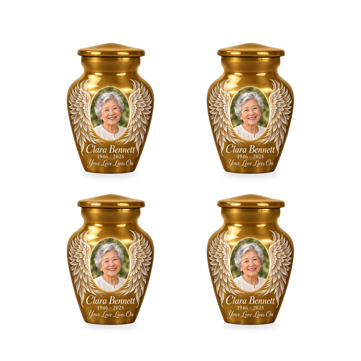 Four matching gold angel wings keepsake urns with sample photo and inscription.
