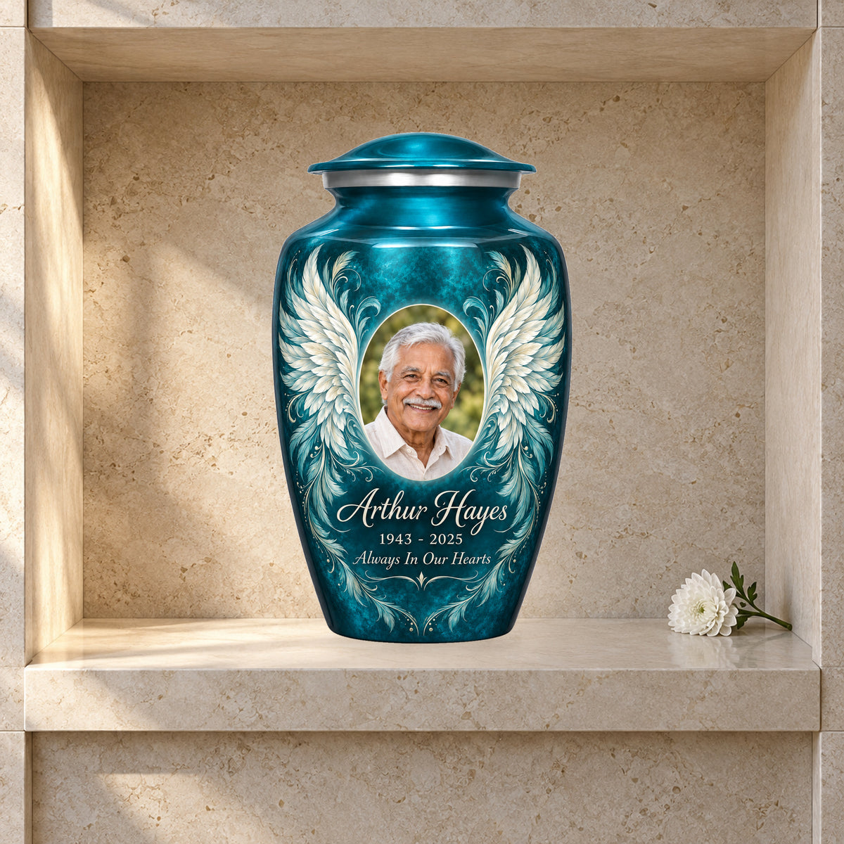 blue adult urn with Turquoise Filigree Wings angel wings artwork displayed in a columbarium niche.