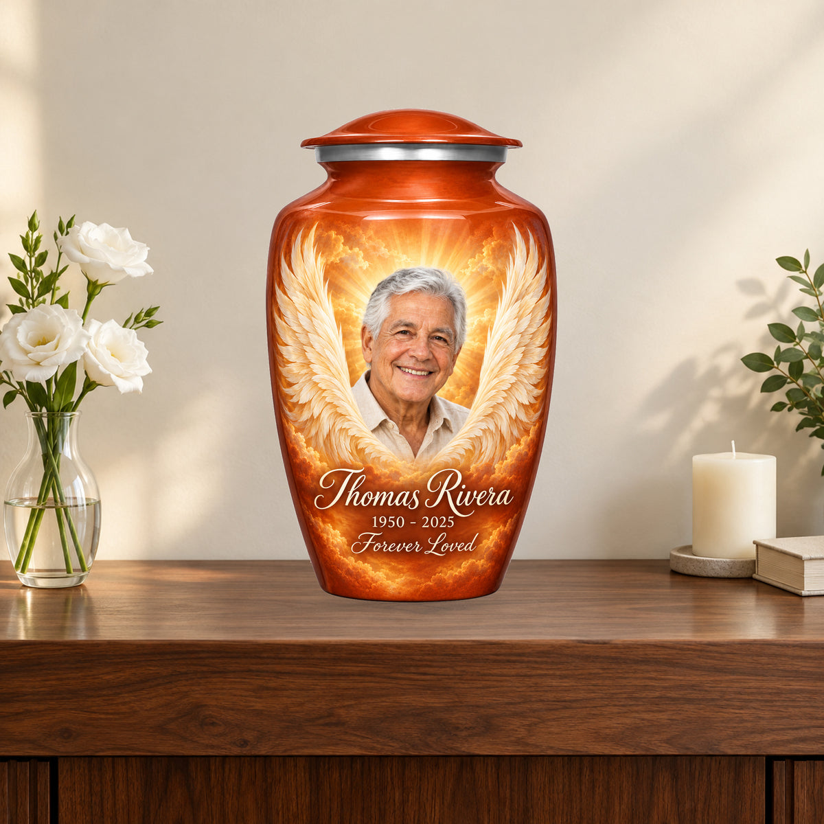 orange personalized angel wings adult urn on a memorial console.