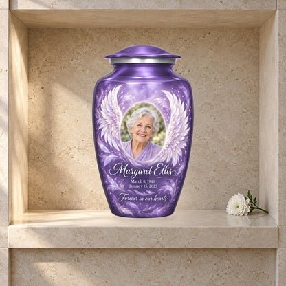 purple adult urn with Lilac Diagonal Wings angel wings artwork displayed in a columbarium niche.