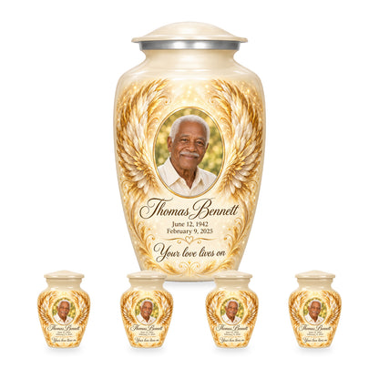 white adult angel wings urn with four matching keepsakes shown in proportional 10-inch and 3-inch sizes.
