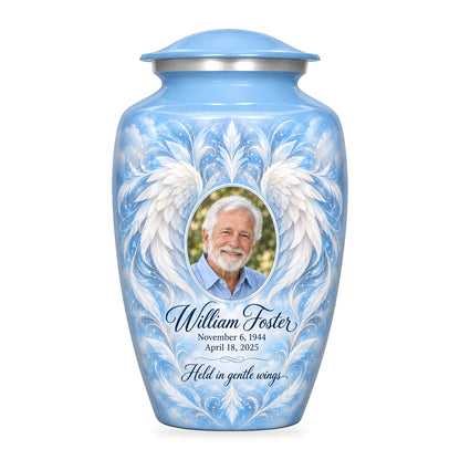 blue adult urn with Sky Feather Mandala angel wings artwork, fictional sample portrait and personalized inscription on white.