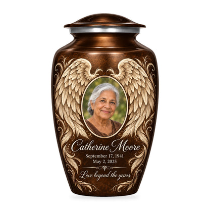 brown adult urn with Bronze Etched Wings angel wings artwork, fictional sample portrait and personalized inscription on white.