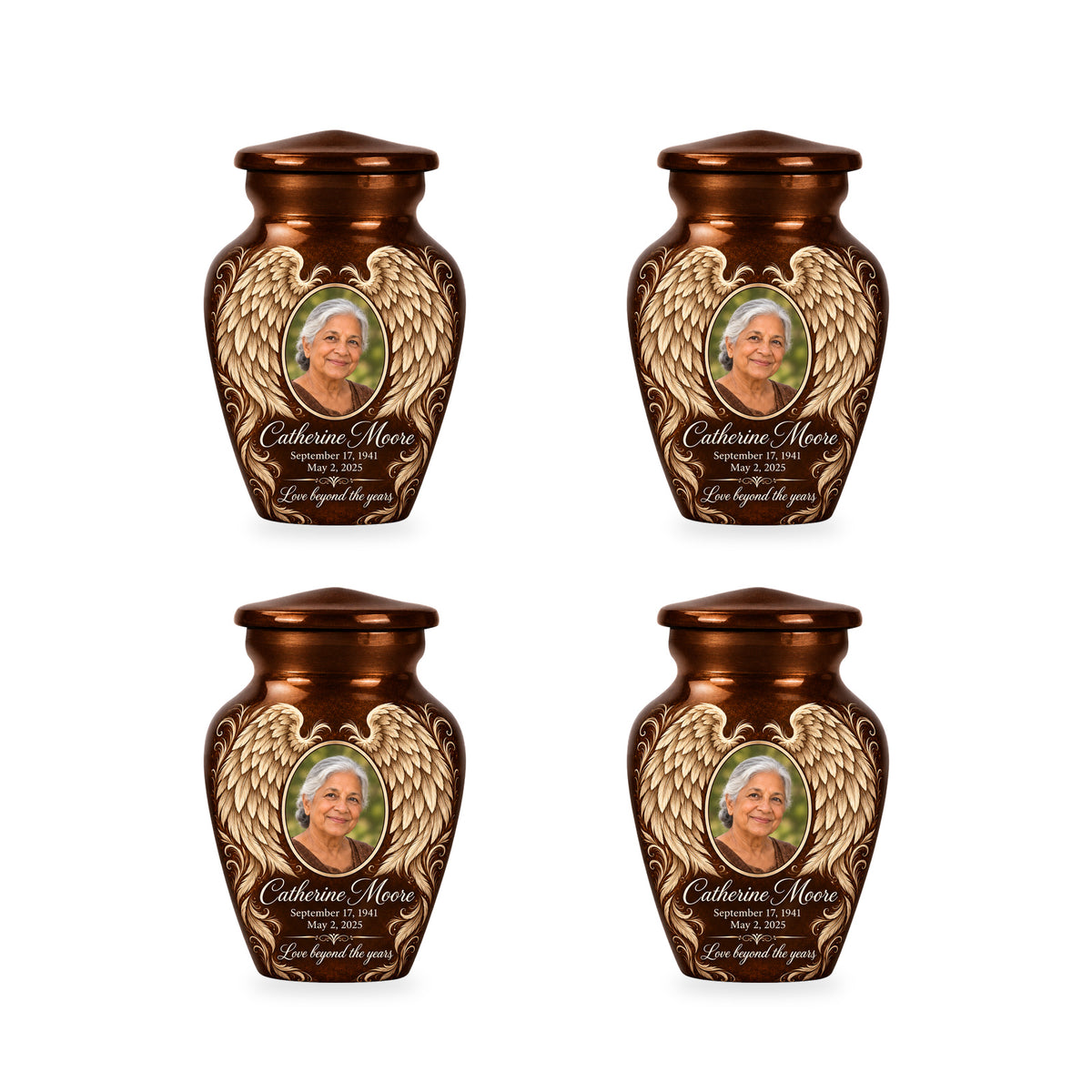Four matching brown angel wings keepsake urns with sample photo and inscription.