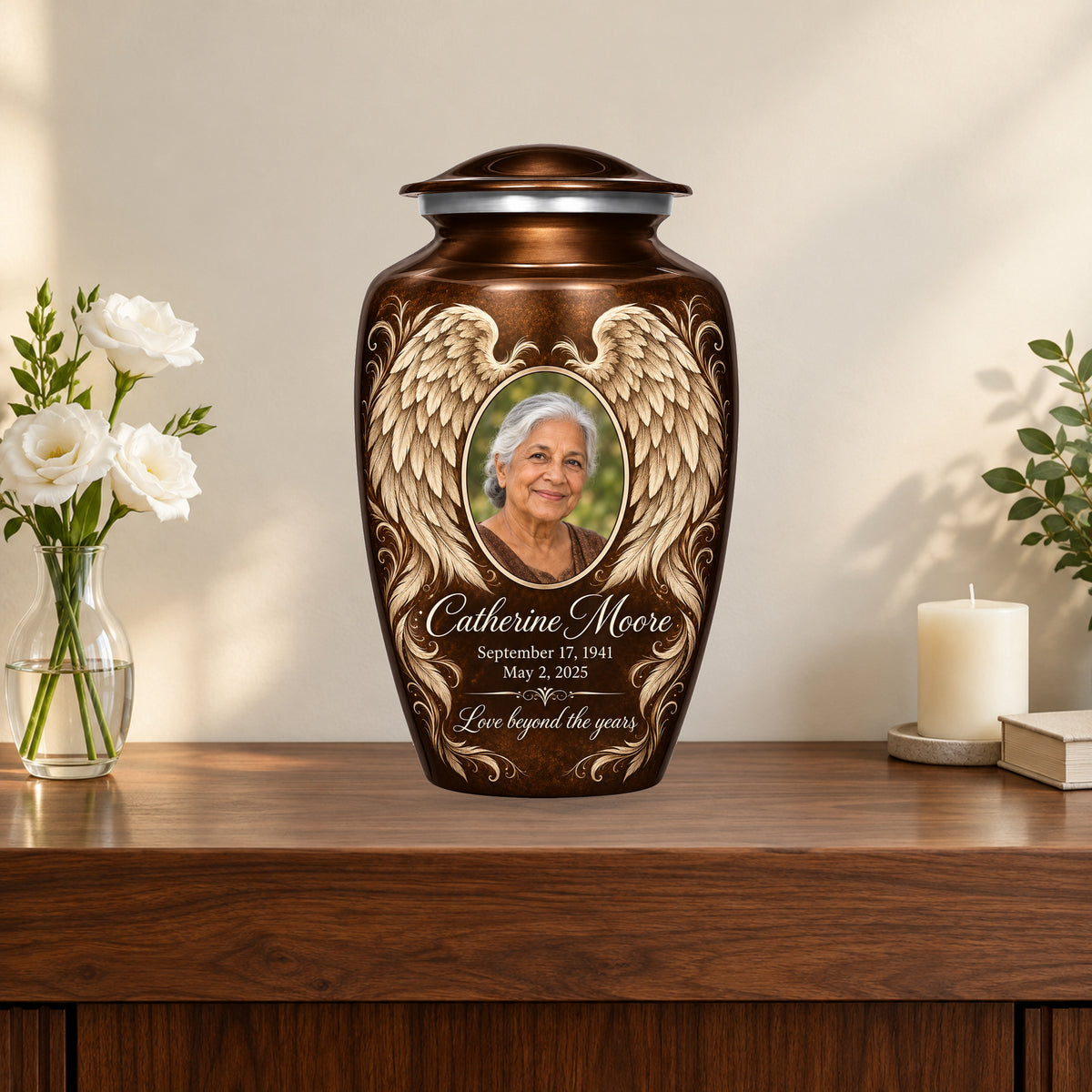 brown personalized angel wings adult urn on a memorial console.