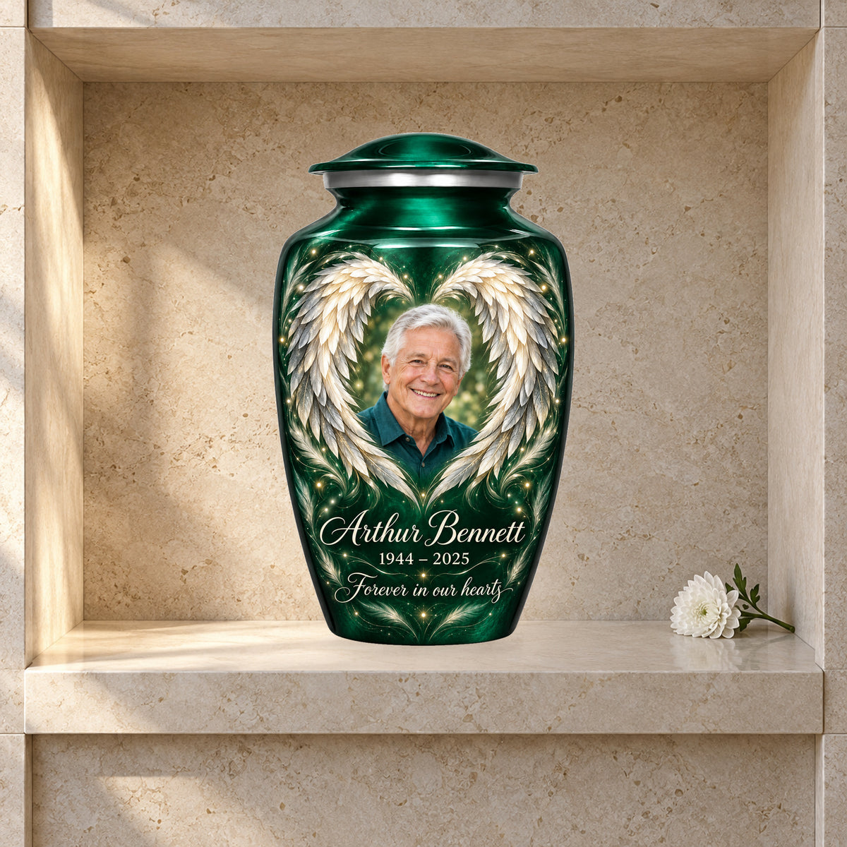 green adult urn with Emerald Heart Wings angel wings artwork displayed in a columbarium niche.